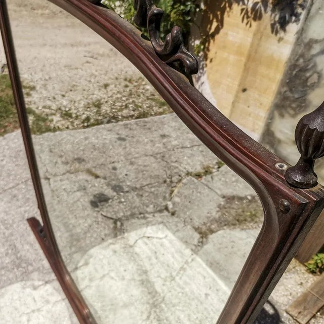 Mirror, wavy wooden mirror, with lateral shell pine cones and floral decoration carved on the sides at the bottom italy...