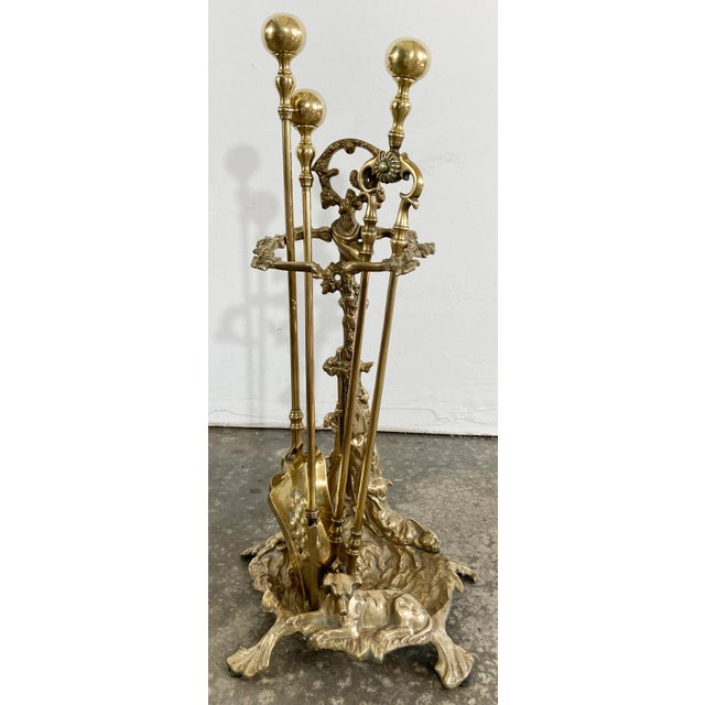 Antique late 19th C French cast brass fireplace tool holder. The holder is solid brass and depicts a charming Art Nouveau...