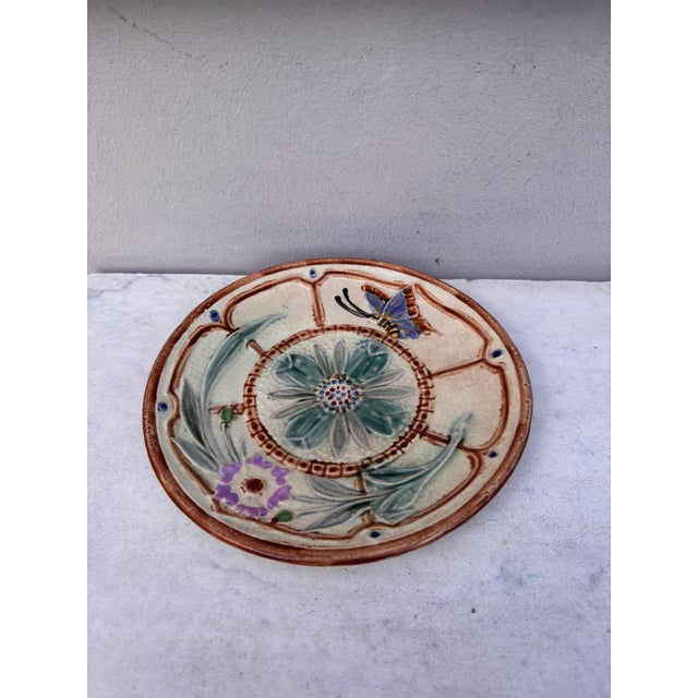 Majolica flowers and butterfly plate Wasmuel circa 1890.