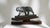 This elegant vintage plaster sculpture depicts a jaguar in motion; head slightly lowered, placing one foot in front of the...