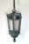 Antique Traditional style ceiling lantern designed for both indoor and outdoor use in entryways or porches. It features a...