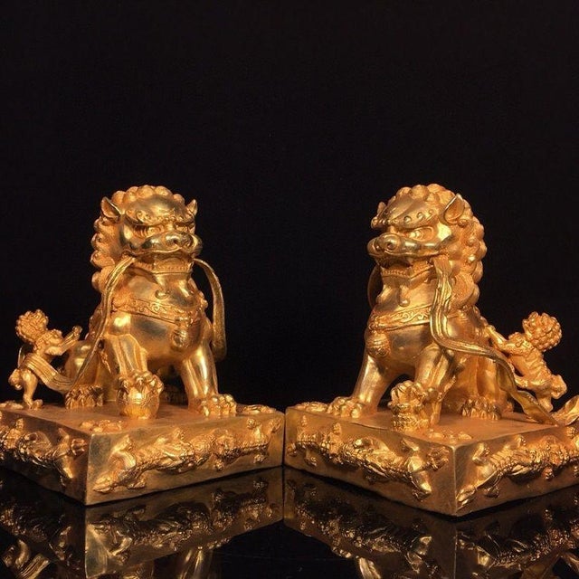 Late 20th Century Pair of Gilt Bronze Guardian Lions – 7.9" Foo Dogs on Dragon Relief Bases With Xuande Mark For Sale - Image 5 of 9