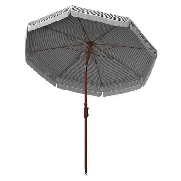 Give your backyard a touch of coastal cool flair with this Copen Umbrella. Copen’s unique pairing of a classic black and...