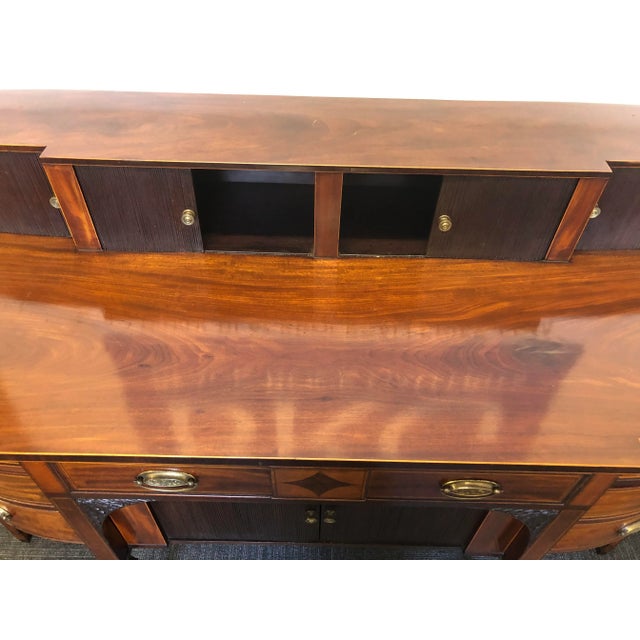 A fine quality mahogany Georgian Scottish sideboard with a stepped raised upper section and typical Scottish design....