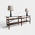 Hand-turned solid wood base. Polished clear tempered glass top. Fine brass accents. We have a custom 8’ console in walnut...