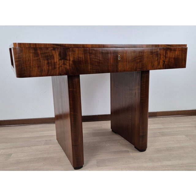 Rare Venetian Art Deco rectangular gaming table entirely in walnut feather and ebonized feet. Used as a desk as it is...