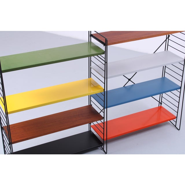 Characteristic and very decorative modular shelving unit or room divider from the Netherlands, all genuin Tomado. Heavy...