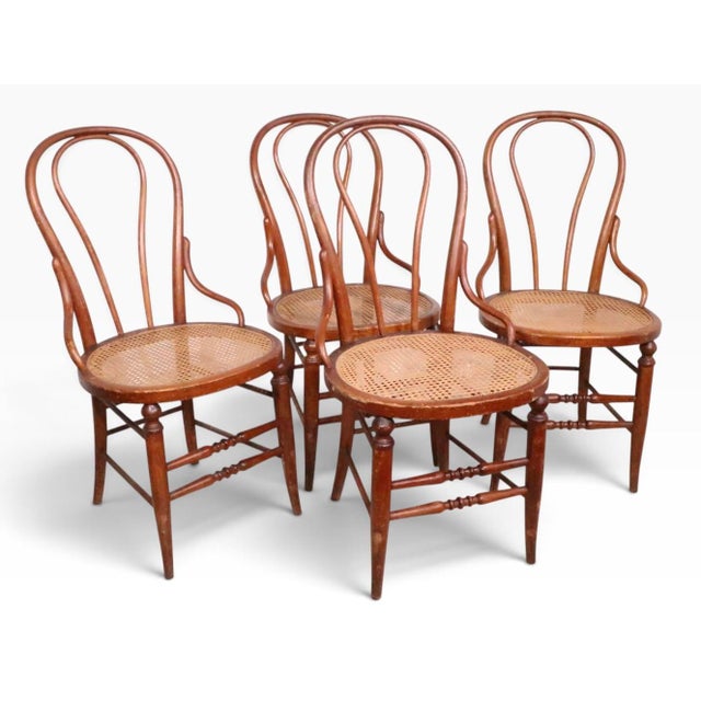 Set of four early bentwood cafe, bistro style dining chairs, in very good, original, clean and ready to use condition. The...