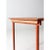 This antique “clipper” style folding table features a bold painted finish in warm orange with contrasting black accents...