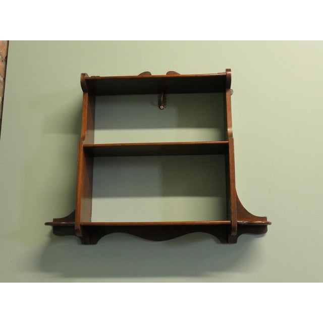 Arts and Crafts Wall Hanging Shelves This charming little shelf unit has 3 shelves in all with a decorative gallery along...