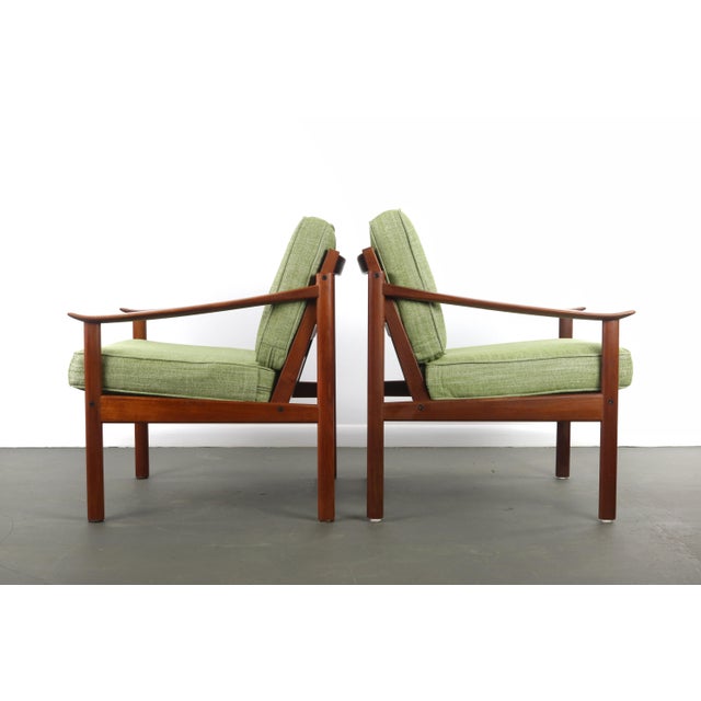 Rare pair of lounge chairs by Peter Hvidt & Orla Mølgaard, by Soborg, Denmark. Solid teakwood and fabric. Designed in...