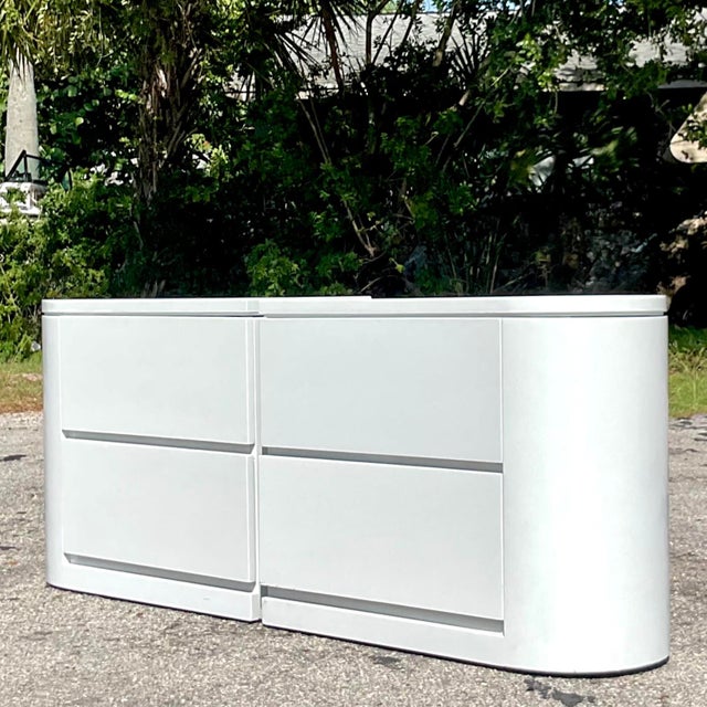 Add a touch of charm to your bedroom with our American-style Vintage Boho Laminate Nightstands. Featuring a sleek laminate...