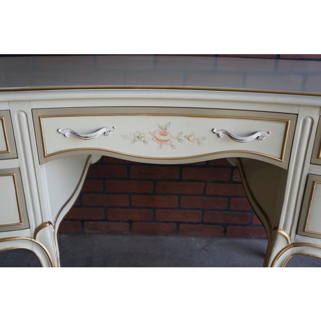 Classic French Provincial style abounds with details such as the gracefully scalloped apron, sweet hardware and curvaceous...
