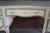 Classic French Provincial style abounds with details such as the gracefully scalloped apron, sweet hardware and curvaceous...