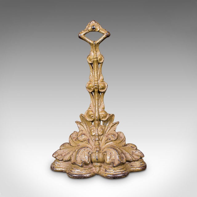 This is an antique decorative doorstop. A French, cast iron Art Nouveau door keeper, dating to the late 19th century,...