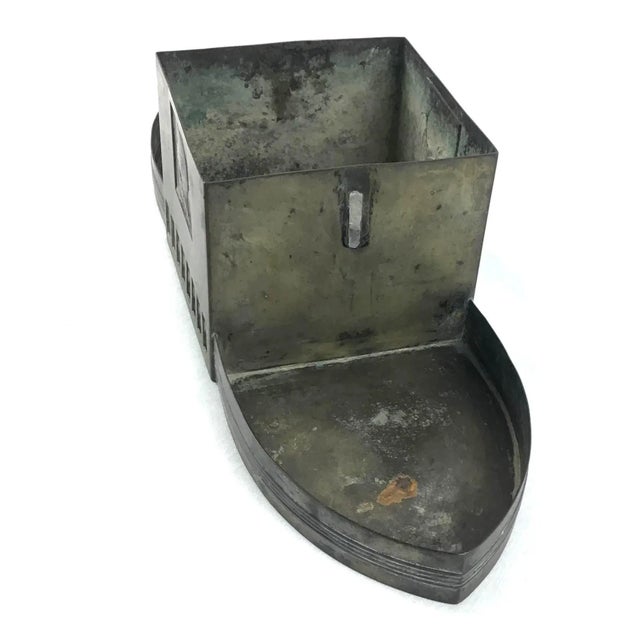 We are not sure what this actually is? Made of beautiful metal, perhaps bronze? But is it a planter? Or a desk set? It is...