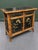 This is a striking vintage bamboo and black lacquer Chinoiserie cabinet in the English Aesthetic Movement tradition. It...
