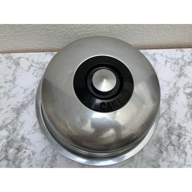 Vintage 1950s large metal rotating base with large dome cover with CAKE written in three dimensional letters. Fab for...