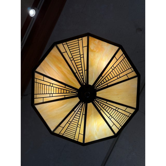 Design Plus Gallery presents an Arts & Crafts Style Pendant by Fredrick Ramond. The pendant is from the era of Frank Lloyd...