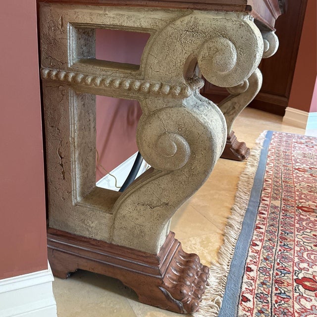 This sideboard, console table measures 20“ deep x 33 1/2“ tall. It has a black-green marble top with stone legs finished...