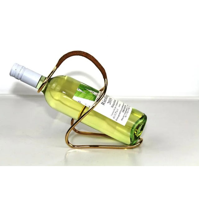 gold-plated brass frame, raffia winding I have official proof of authenticity such as vintage catalogs, designer records,...