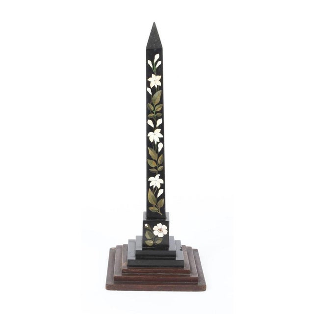This is a wonderful Derbyshire Ashford pietra dura obelisk, inlaid with lillies, circa 1880 in date. The obelisk is...
