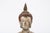 A pair of vintage terracotta standing Buddha figures in flowing robes with a flame finial head-dress, elongated earlobes,...