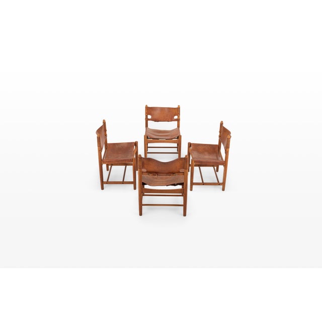 A set of four vintage dining chairs from denmark. These "spanish" chairs were designed by børge mogensen in the 1950s. The...