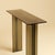 The Naz is a bronzed glass console table, a study in transparency built from Italian glass rather than stone. It trades...