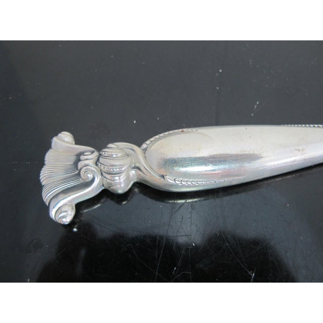 Wallace sterling silver solid handle, stainless blade in ornate Romance of the Sea pattern. Multiple available. Measures 9...