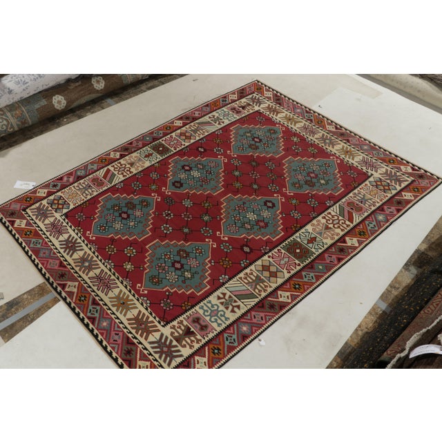 Handwoven in wool, this antique Kilim is the latest unveiled from R&K Principal Josh Nazmiyal’s coveted classic flat...