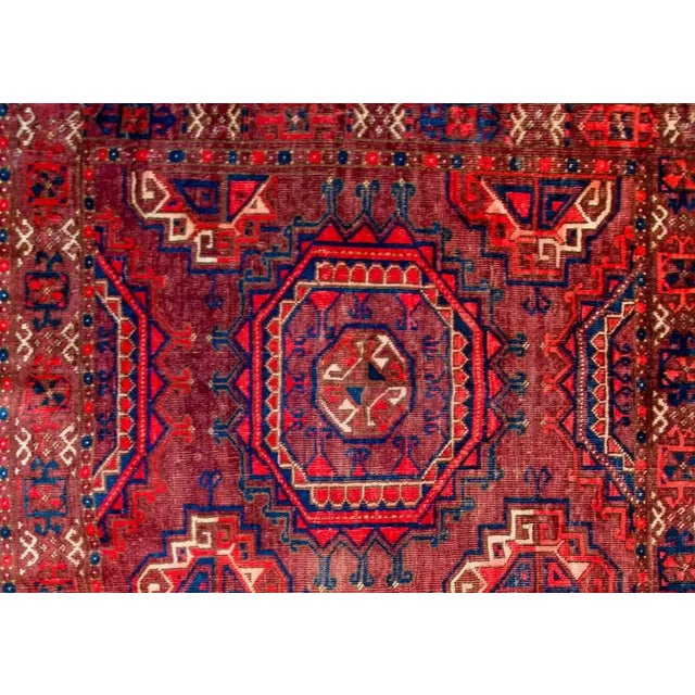 Early 20th century Turkmen Juval bag face with a beautiful pattern containing two large-scale octagonal medallions amidst...