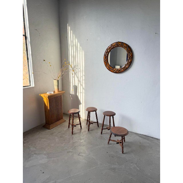 Antique set of four oak stools. We love their elegant aesthetic, with the various details on the turned wooden legs and...