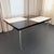 This rare "Gazelle" dining table by Shelby Williams masterfully blends organic mid-century modernism with atomic-age...