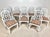Vintage set of 10 pagoda dining chairs. Ten arm chairs with fretwork detail on back and arms. Classic Palm Beach regency...