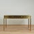 Chic mid century desk or bureau plat crafted in brass with a custom acid washed finish, featuring a tooled leather top on...