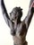 This exceptional hand-crafted studio ceramic sculpture depicts a proud and commanding African female warrior in a...
