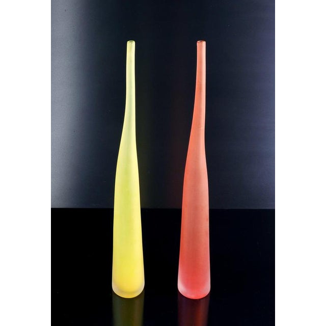 Two bambù vases, designed by laura diaz de santillana for arcade. Blown glass, shaped and polished by hand. Numbered....