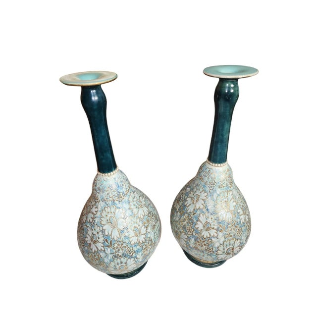 Stunning pair of Royal Doulton Lambeth, Slaters patent, bottleneck vases, circa 1883-1886. Evidence of previous repair to...