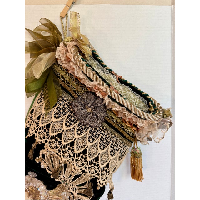 Here is a beautifully handcrafted Victorian-style Christmas stocking dating to the later part of the 20th century. Richly...