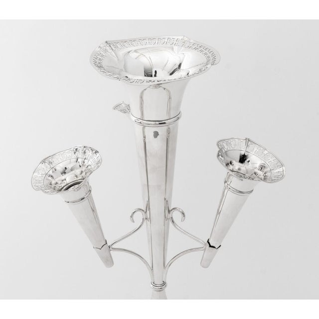 S.J. Levi and Company Silver Plate Four Trumpet Epergne, the removable trumpets with pierced rims with three scroll form...