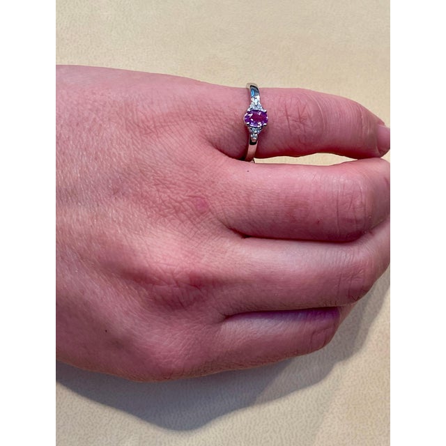 A classic, Ring Approximately 0.25 Ct natural Pink sapphire and 6 Round Diamond 14 Karat White gold Ring Makes a nice gift...