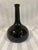 This modern era onion bottle would make a great decorative statement in a nautical or rustic European themed space. It has...