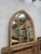 This massive wooden and metal mirror was crafted from an old chapel stained-glass window. Antique mirrors have replaced...