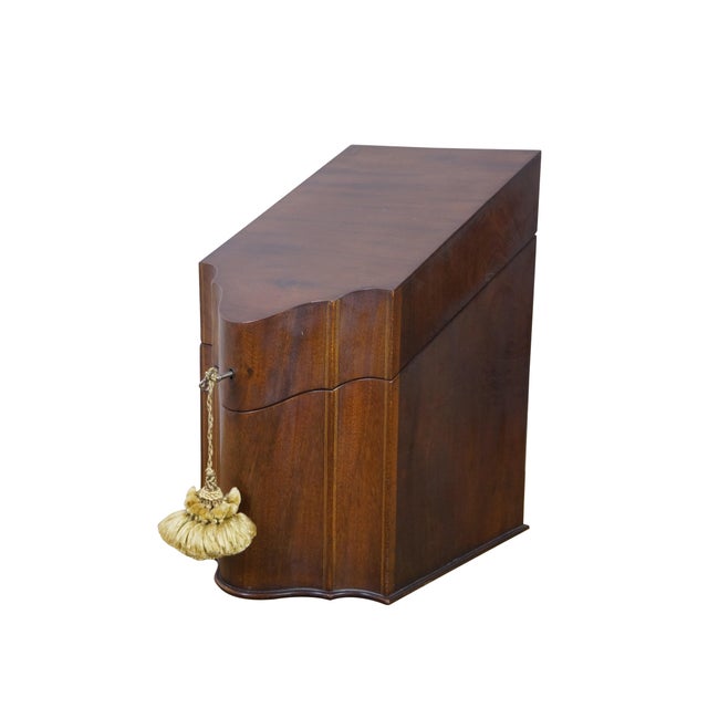 An elegant pair of George III mahogany knife boxes from the late 18th Century showcases exceptional Georgian...