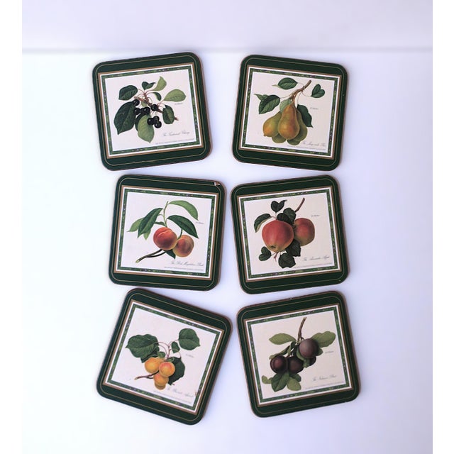 A beautiful set of six (6) English cocktail drinks coasters with botanical fruit design, circa late-20th century, England....