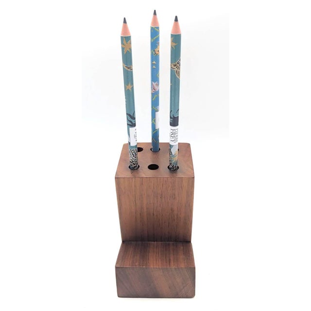 Offered is a vintage mid 20th Century, circa. 1960s to 1970s desk-top staved Walnut wood pencil holder. It holds up to 6...