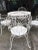 Iron garden set: a table and 4 very sturdy and solid chairs.