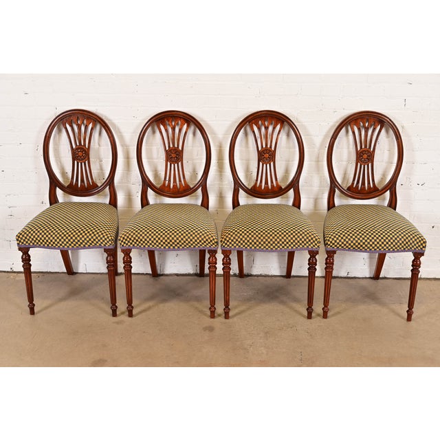 A gorgeous set of four French Regency Louis XVI style side chairs or dining chairs By Bevan Funnell Ltd. USA, Circa Late...