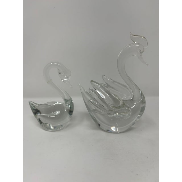 This nice pair of Murano Glass Swans are a lovely decorative piece. The larger swan measures 6" tall and was made by...